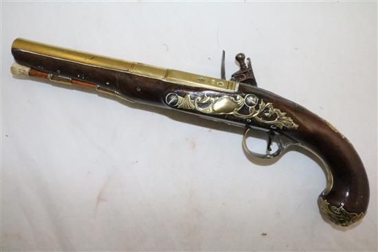 A late 18th century brass barrelled flintlock holster pistol, 14in.